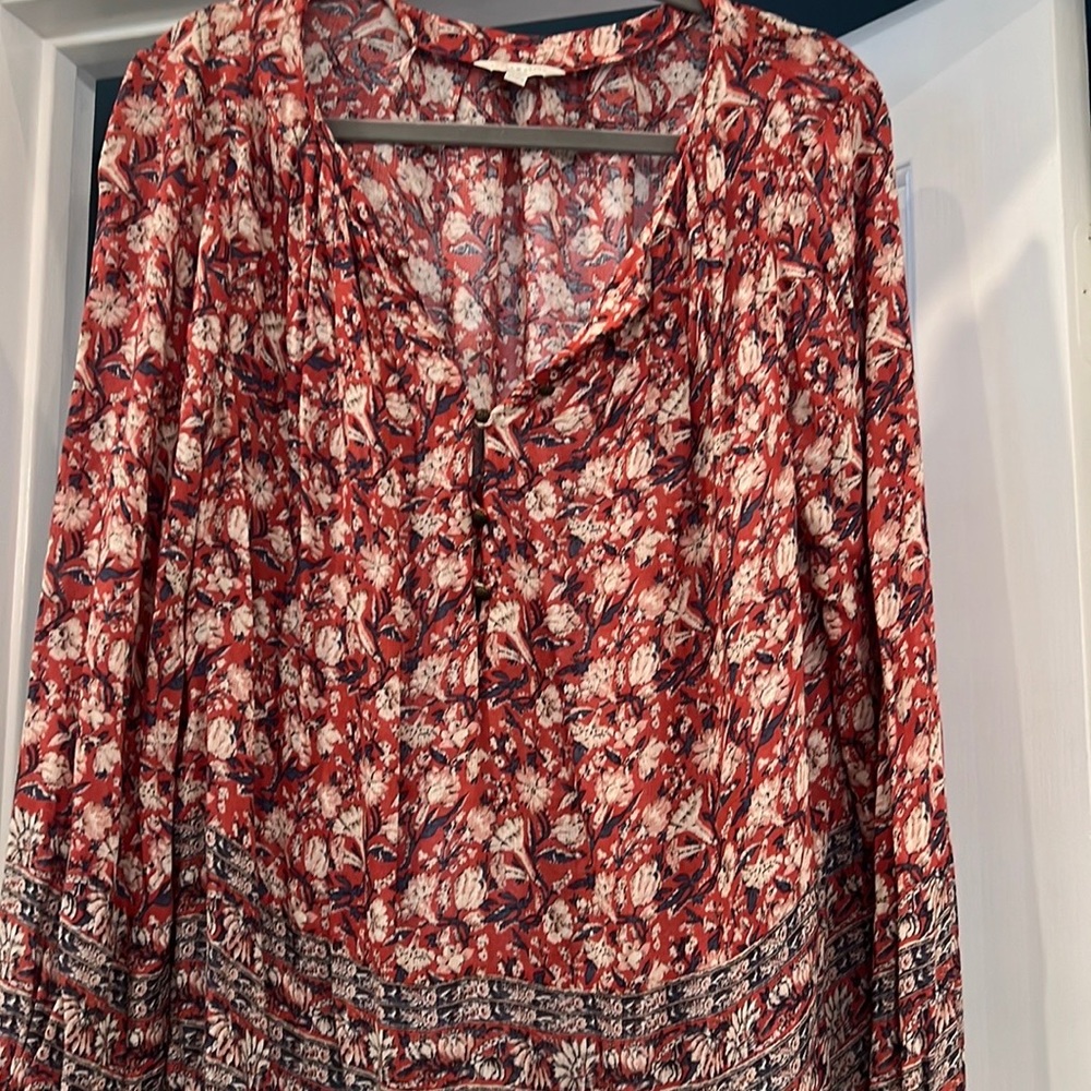 New condition Maybe worn once. Very pretty and bouncy boho look.